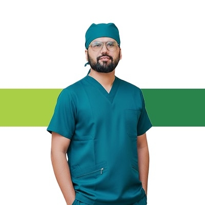 Dr. Muhammad Asad in surgical scrubs
